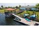 Waterfront community access with kayak launch, boat dock, and covered pavilion for recreation and relaxation by the lake at 4772 Kings Castle Cir, Kissimmee, FL 34746