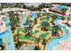 Aerial shot of the incredible lazy river, pool, and mini golf available at this community at 4772 Kings Castle Cir, Kissimmee, FL 34746