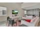 Spacious living room with high ceilings, a large sofa, and an entertainment center with a TV at 4772 Kings Castle Cir, Kissimmee, FL 34746