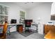 Bright home office with natural light, spacious desk area, and comfortable seating for a productive workspace at 4793 Grassy Knoll Dr, Tavares, FL 32778