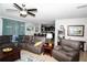 Comfortable living room with plush seating and an open floor plan at 4793 Grassy Knoll Dr, Tavares, FL 32778