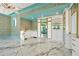 A custom closet with elegant marble countertop and walls, with marble floors at 5525 Isleworth Country Club Dr, Windermere, FL 34786