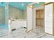 Custom-designed closet features high-end finishes like marble counters and custom storage at 5525 Isleworth Country Club Dr, Windermere, FL 34786