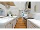 Bright kitchen with custom cabinetry, double islands and professional-grade appliances at 5525 Isleworth Country Club Dr, Windermere, FL 34786