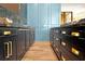 Kitchen showcases custom cabinetry, stone countertops, and contemporary finishes, blending style and functionality at 5525 Isleworth Country Club Dr, Windermere, FL 34786