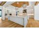 Gourmet kitchen features double islands, custom cabinetry and an open floor plan at 5525 Isleworth Country Club Dr, Windermere, FL 34786