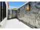 Modern outdoor shower featuring unique tile walls and contemporary lighting fixtures at 5525 Isleworth Country Club Dr, Windermere, FL 34786