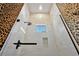Modern shower with white subway tile, glass enclosure, and sleek black hardware at 5525 Isleworth Country Club Dr, Windermere, FL 34786