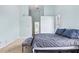 Light and bright bedroom features neutral carpet, modern decor, and an ensuite bathroom at 633 Lakehaven Cir, Orlando, FL 32828