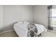 Neutral guest bedroom featuring bright window and cozy bed at 633 Lakehaven Cir, Orlando, FL 32828