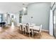 Spacious dining room with hardwood floors and seating for six at 633 Lakehaven Cir, Orlando, FL 32828