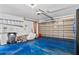 This garage has epoxy floor, garage door opener and rolling metal garage door at 633 Lakehaven Cir, Orlando, FL 32828