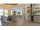 Open-concept living area featuring a wet bar with wine fridge and seamless flow to other rooms at 6350 Sedona Leaf Ct, Windermere, FL 34786