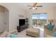 Inviting living room with a slider to balcony and a comfortable seating arrangement perfect for relaxing at 7650 Comrow St # 403, Kissimmee, FL 34747