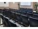Community movie theater features comfortable seating for residents' enjoyment at 7650 Comrow St # 403, Kissimmee, FL 34747