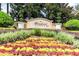 Windsor Hills sign with colorful landscaping at 7650 Comrow St # 403, Kissimmee, FL 34747