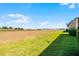 Expansive grassy backyard, perfect for outdoor activities and enjoying nature at 774 Chelsea Dr, Davenport, FL 33897