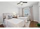 This bedroom features two twin beds and a window for natural light at 774 Chelsea Dr, Davenport, FL 33897