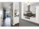 Open concept kitchen with view to the living area, stainless appliances and modern finishes at 774 Chelsea Dr, Davenport, FL 33897