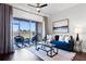 Comfortable living room with sliding glass doors to the patio, offering seamless indoor-outdoor living at 774 Chelsea Dr, Davenport, FL 33897