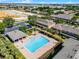 Aerial view featuring a clear blue community pool with a cabana at 774 Chelsea Dr, Davenport, FL 33897