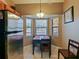 Kitchen nook with a window and a stainless steel refrigerator at 7768 Sugar Bend Dr # 7768, Orlando, FL 32819