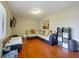 Spacious living room featuring laminate wood floors and contemporary furnishings at 7768 Sugar Bend Dr # 7768, Orlando, FL 32819