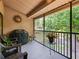 Relaxing screened patio with furniture and outdoor grill at 7768 Sugar Bend Dr # 7768, Orlando, FL 32819