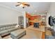 Inviting living area with an open layout to the kitchen and dining space, perfect for modern living and entertaining at 7819 Hardenton St, Windermere, FL 34786