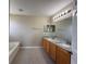 Bathroom showcasing double sinks, granite countertops, and ample vanity space at 786 Crystal Bay Ln, Orlando, FL 32828