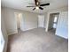 Bedroom featuring neutral walls, carpet floors, a ceiling fan, and closet at 786 Crystal Bay Ln, Orlando, FL 32828