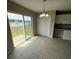 Dining nook featuring lake views and white cabinets at 786 Crystal Bay Ln, Orlando, FL 32828