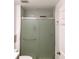 Bathroom featuring frosted glass shower, modern hardware, and contemporary design at 8973 Lee Vista Blvd # 2308, Orlando, FL 32829