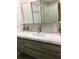 Stylish bathroom featuring modern vanity with a white countertop and sleek fixtures at 8973 Lee Vista Blvd # 2308, Orlando, FL 32829