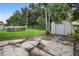 A spacious backyard featuring a shed and an above-ground pool at 10140 Bridlewood Ave, Orlando, FL 32825