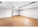 This is a large garage with painted floors and walls, and an exterior door at 10140 Bridlewood Ave, Orlando, FL 32825