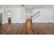 Hardwood floors throughout the expansive open-concept living and dining area at 1018 Boxelder Ave, Minneola, FL 34715