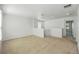 Spacious loft with plush carpet and ample room for seating and lounging at 1018 Boxelder Ave, Minneola, FL 34715