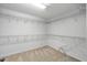 Walk-in closet with wire shelving providing ample storage space at 1018 Boxelder Ave, Minneola, FL 34715