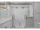 Lavish bathroom featuring a marble shower with dual showerheads and glass doors at 1106 Celebration Ave, Celebration, FL 34747