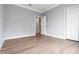 Comfortable bedroom offering wood-look floors, and an open doorway at 1106 Celebration Ave, Celebration, FL 34747