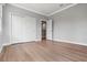 A spacious bedroom with wood-look floors and a double door closet at 1106 Celebration Ave, Celebration, FL 34747