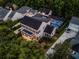 A charming two story home with a front porch and a screened in pool in the backyard at 1106 Celebration Ave, Celebration, FL 34747