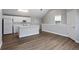 Kitchen featuring an island, white cabinets and stainless steel appliances at 1106 Celebration Ave, Celebration, FL 34747