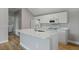 Bright kitchen featuring an island and stainless steel appliances at 1106 Celebration Ave, Celebration, FL 34747