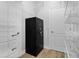 Large walk-in closet featuring a personal safe and white shelving with wire baskets for ample storage at 1106 Celebration Ave, Celebration, FL 34747
