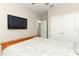 Comfortable bedroom with a ceiling fan, TV, and neutral walls providing a relaxing ambiance at 12272 Bracco St, Winter Garden, FL 34787