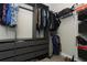 Well-organized walk-in closet with shelving, drawers, and hanging areas for optimal storage solutions at 12272 Bracco St, Winter Garden, FL 34787