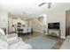 Open-concept living area seamlessly blends living and dining spaces, perfect for modern living and entertaining at 12272 Bracco St, Winter Garden, FL 34787