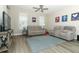 Bright and open living room featuring comfortable seating, modern decor, and abundant natural light at 12272 Bracco St, Winter Garden, FL 34787